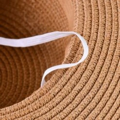 Decopatent Zonnehoed Dames - Bruin Met Zwarte Strik -Kampeerartikelen Korting 66f3cbcb28f418.03850751